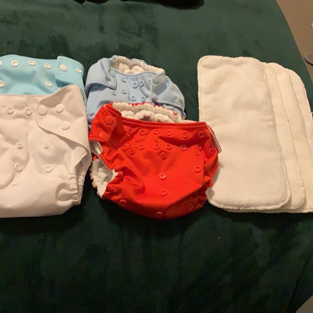 Lot of 4 pocket diapers and 4 pads